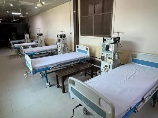 Hospital beds and medical equipment in a care room
